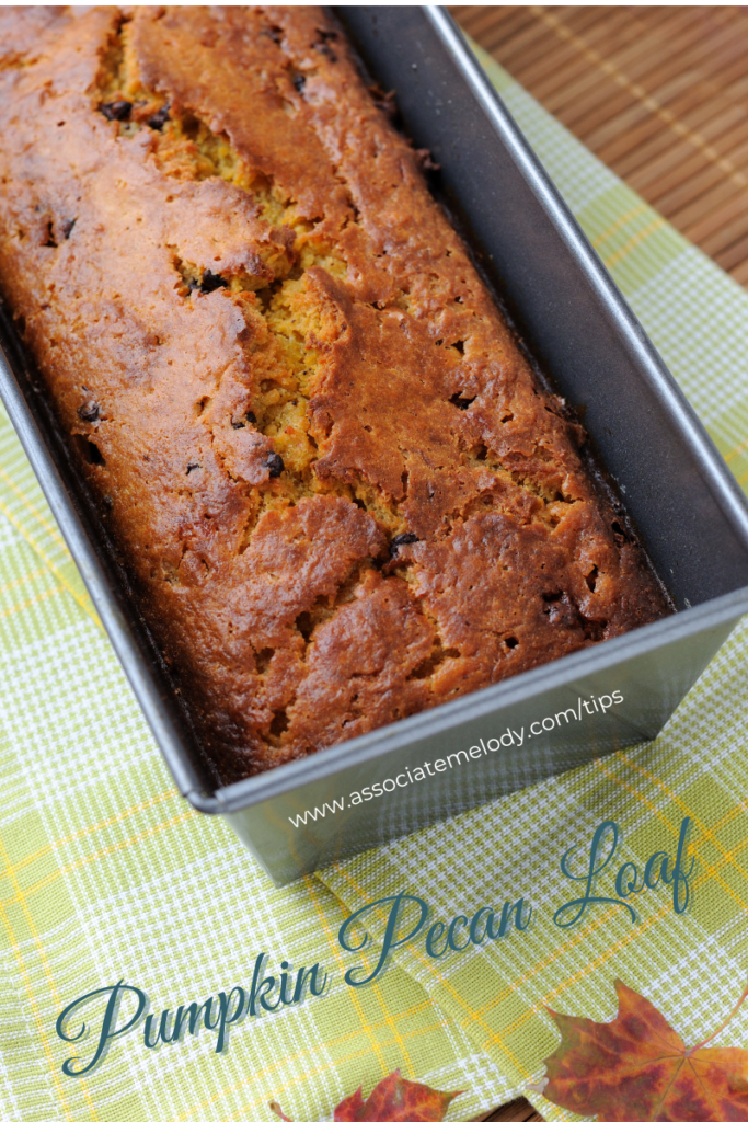 pumpkin pecan loaf cooling in pan